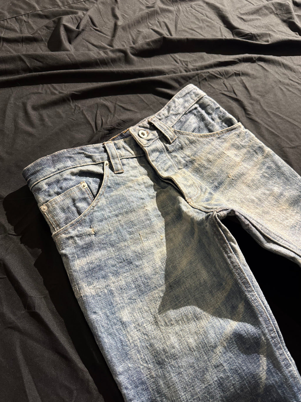 “coated” washed bootcuts