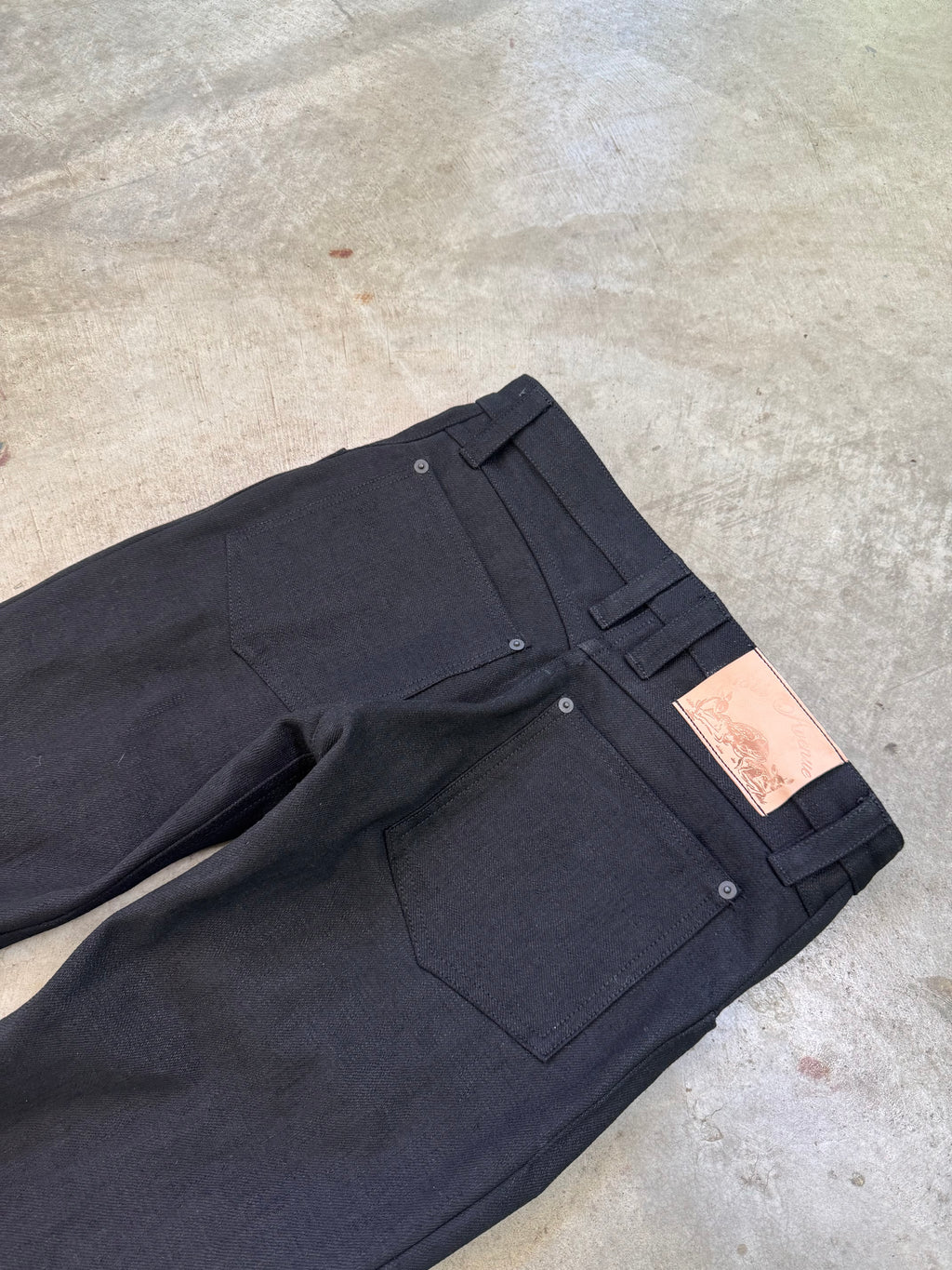 “noir” crosshatch skinny bootcuts