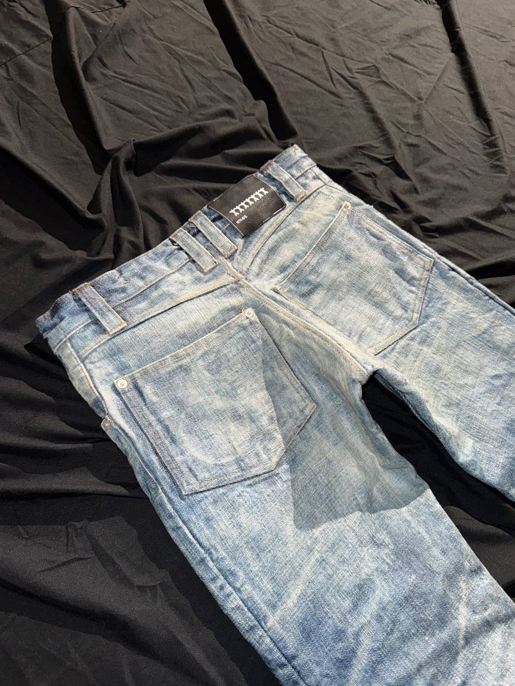 “coated” washed bootcuts