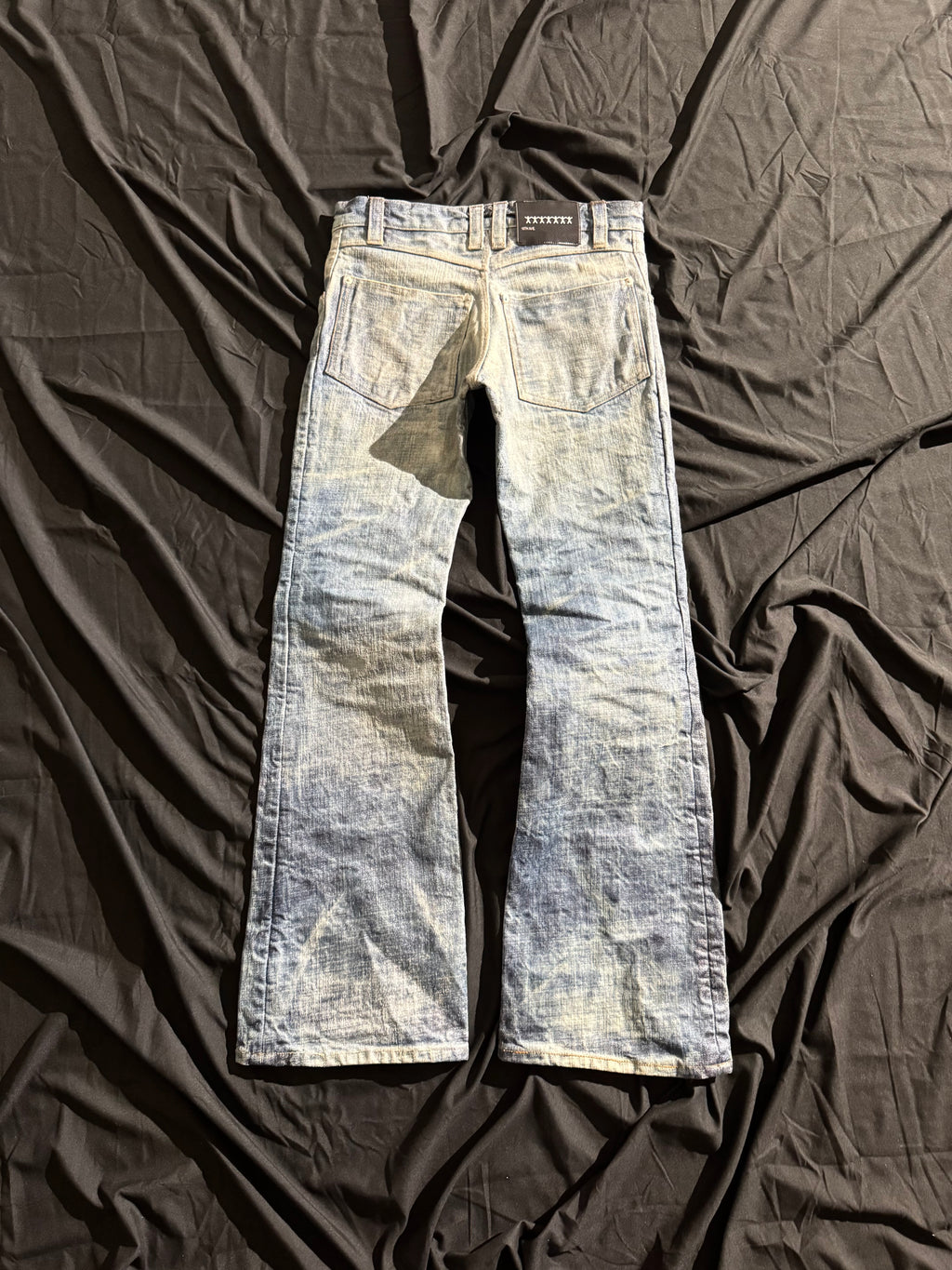 “coated” washed bootcuts
