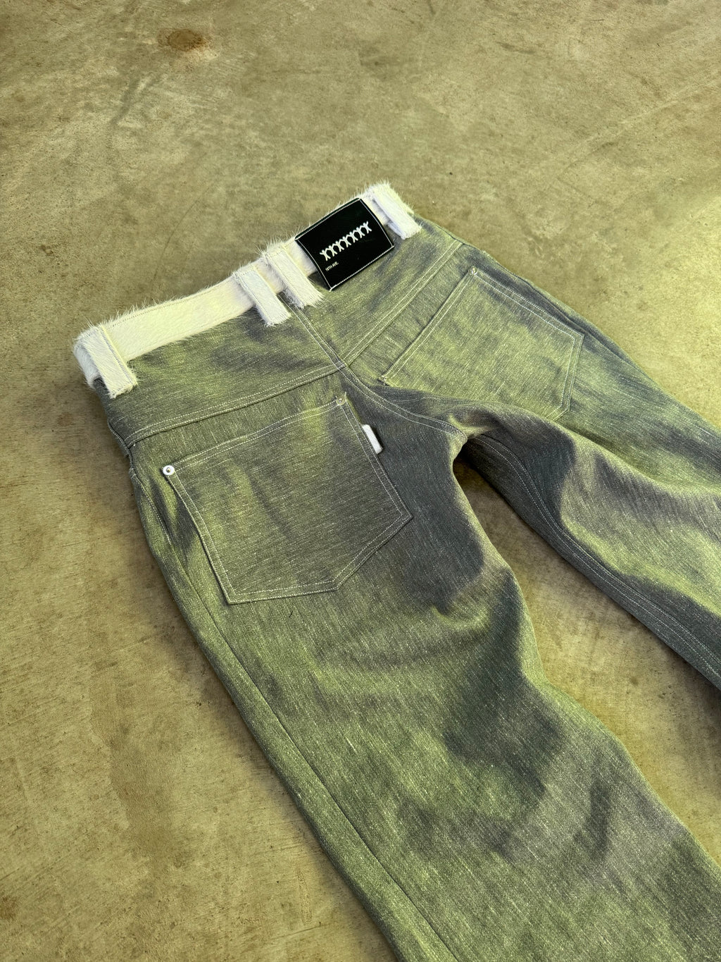 “fuzz” boot-cut denim